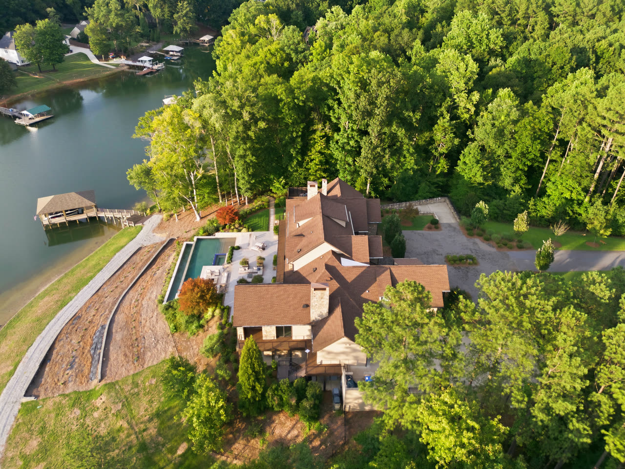 Aerial view down the length of Lake Norman, the estate on the shoreline below.